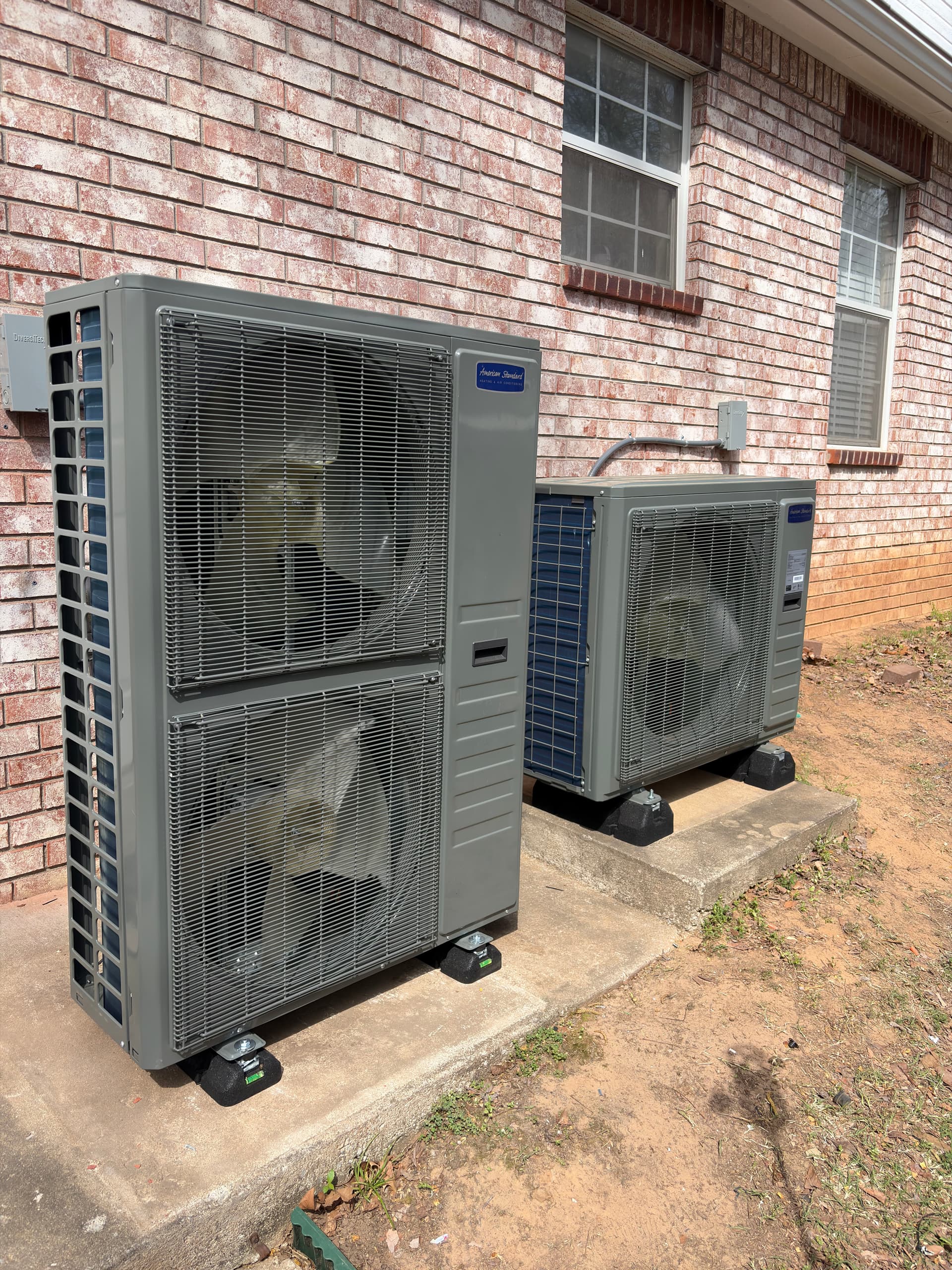 High Efficiency Dual-Fuel Heat Pump System Change-Out Before and After image